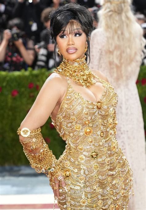 versace boots cardi b|Cardi B gold dress.